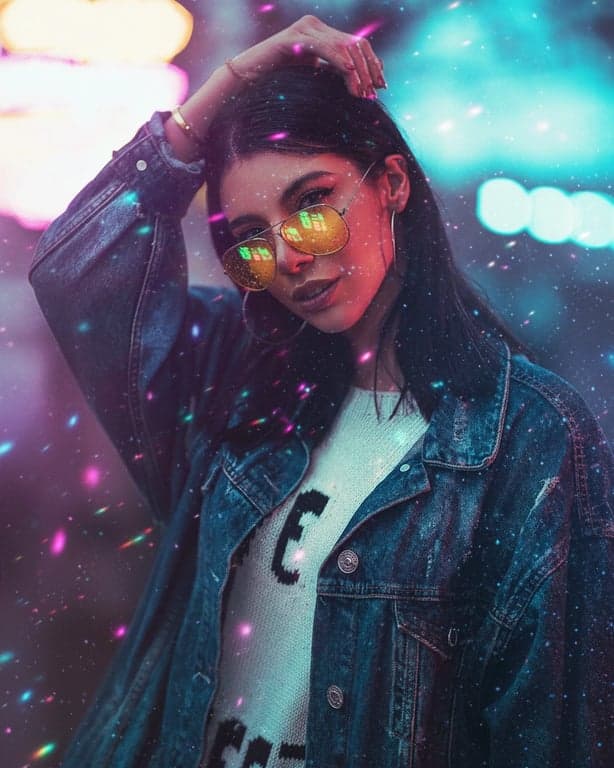 a portrait of a person edited with a neon glow filter, showing vivid reflections of neon signs in their eyes and on rain-kissed skin