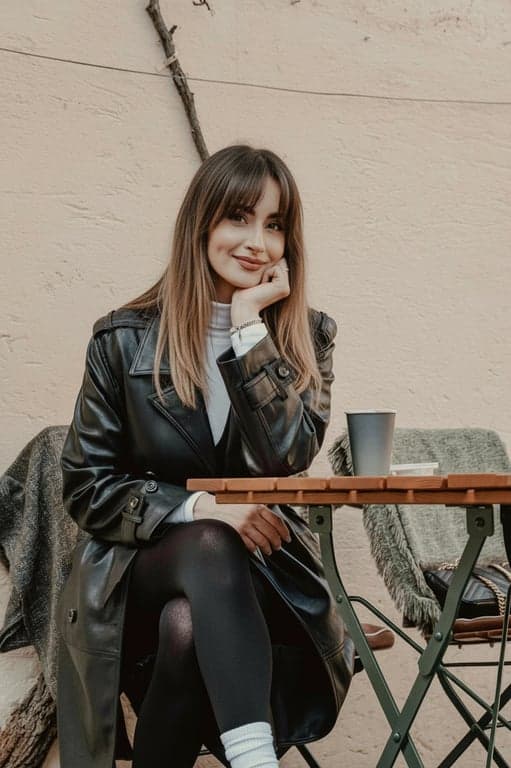 generate a face-framing fringe that enhances facial balance while maintaining natural hair volume, texture, and believable strand flow