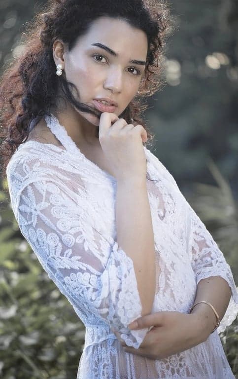 AI piercing filter after transformation - full body photo with visible jewelry piercings