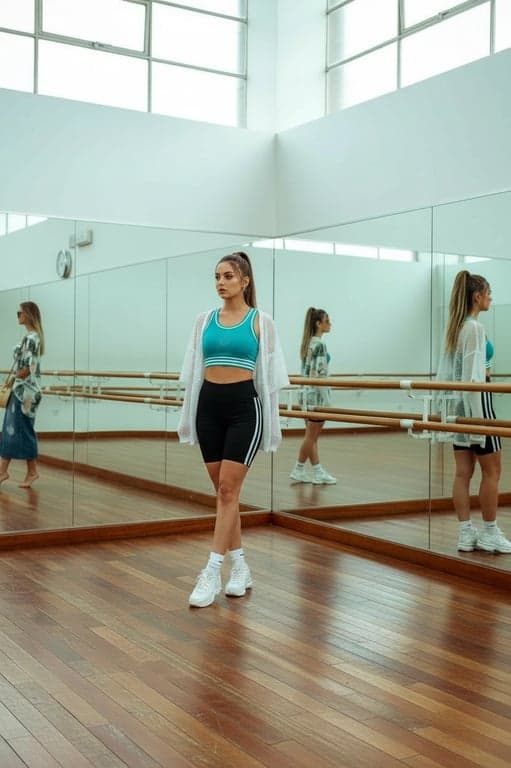 Idol Outfits filter after transformation - portrait in a dance practice idol outfit with studio rehearsal atmosphere