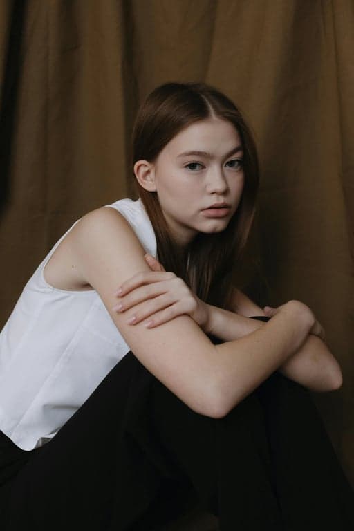 a portrait of a person rendered as a quirky cartoon character featuring asymmetrical facial traits, unusual but cohesive proportions, bold outlines, flat colors, and a distinctive cartoon personality