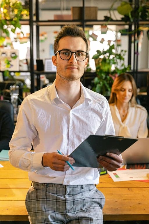 a portrait of a person illustrated in a classic American realism aesthetic with direct gaze, restrained emotion, flat lighting, and grounded everyday American character