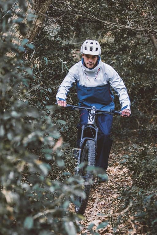 a portrait of a man with flowing hair, psychedelic 60s style, swirling colors, distorted typography, intricate patterns, surreal and energetic vibe.