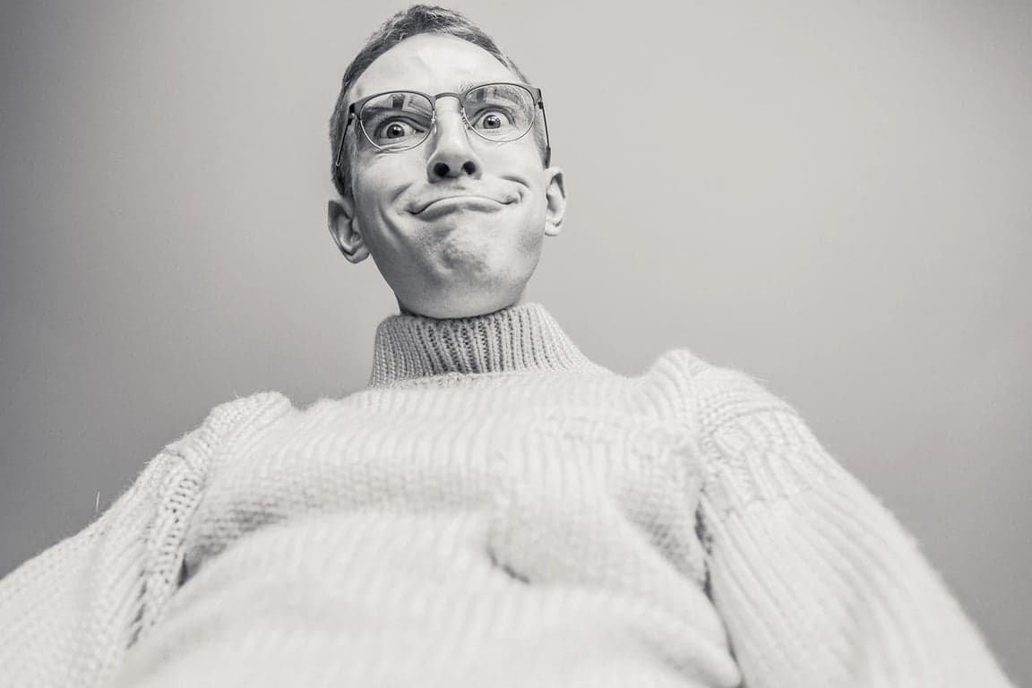 AI ugly filter before photo- elderly man resting in bed smiling