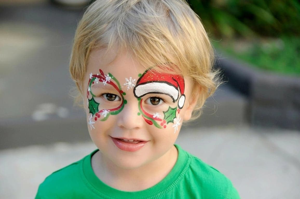 AI baby Christmas photo after photo - baby wearing blue sweater with Christmas decoration