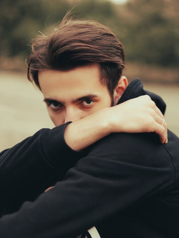 A softly filtered headshot of a man for IG, smooth skin tone, gentle highlight bloom, cohesive color harmony, soft shadow detail, professional yet aesthetic look.