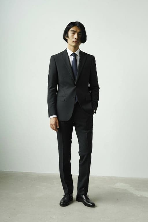 add suit to photo online free – after pic: man dressed in black formal suit, business portrait style