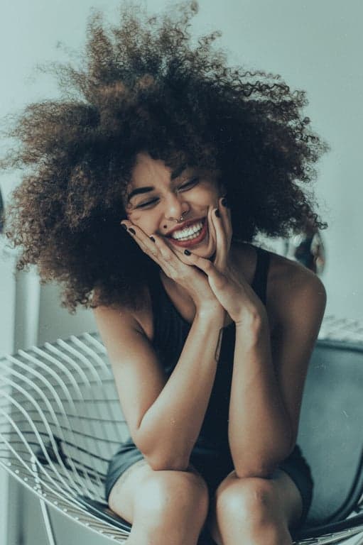 A candid "snapshot" style with the characteristic slight cyan/blue shadow tint and faded highlights of 1950s consumer color film, evoking a family vacation photo.