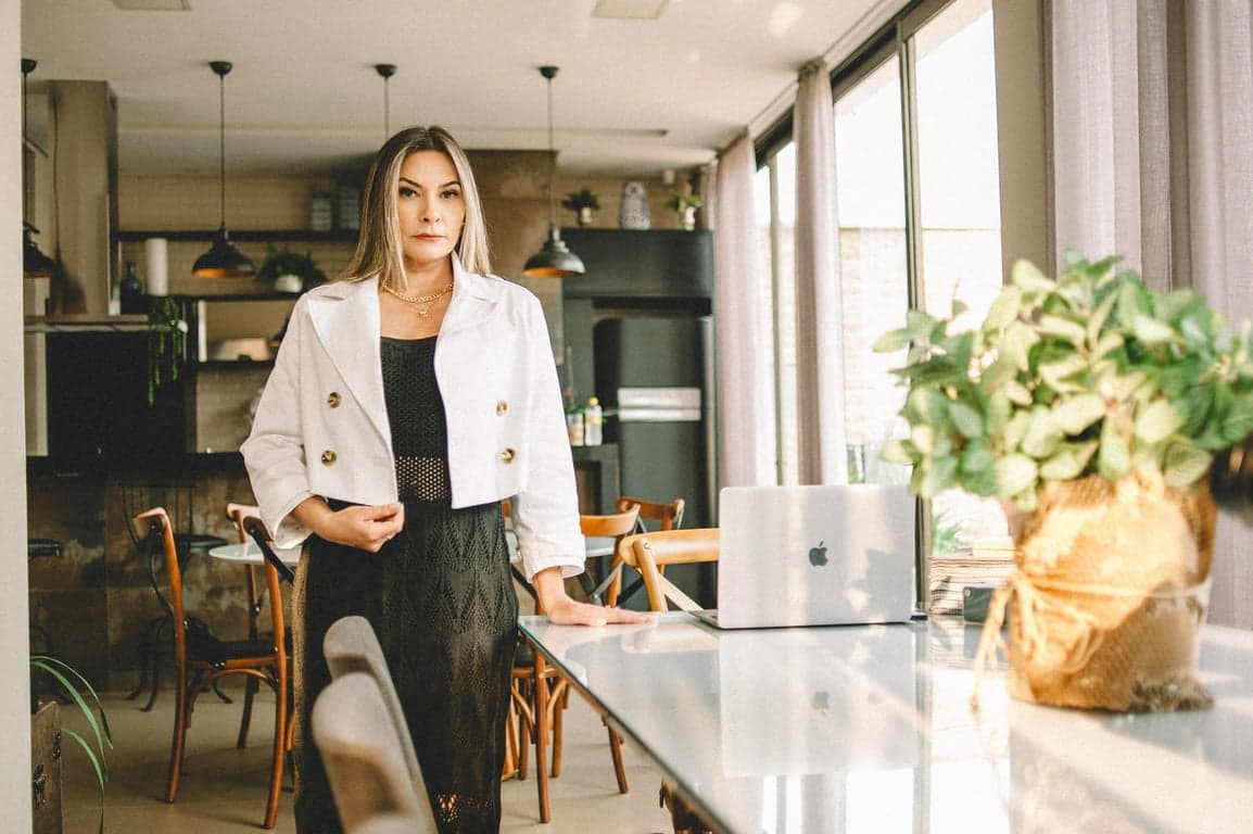 a portrait of a person reimagined as a shoujo anime character with light pastel coloring, subtle blush, soft eye highlights, and smooth line quality