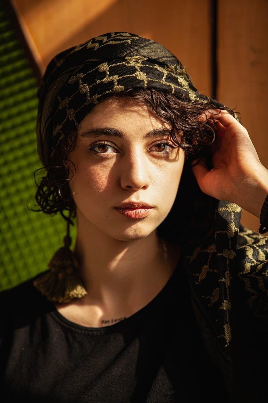 AI smile filter before photo - portrait with neutral facial expression before smile edit