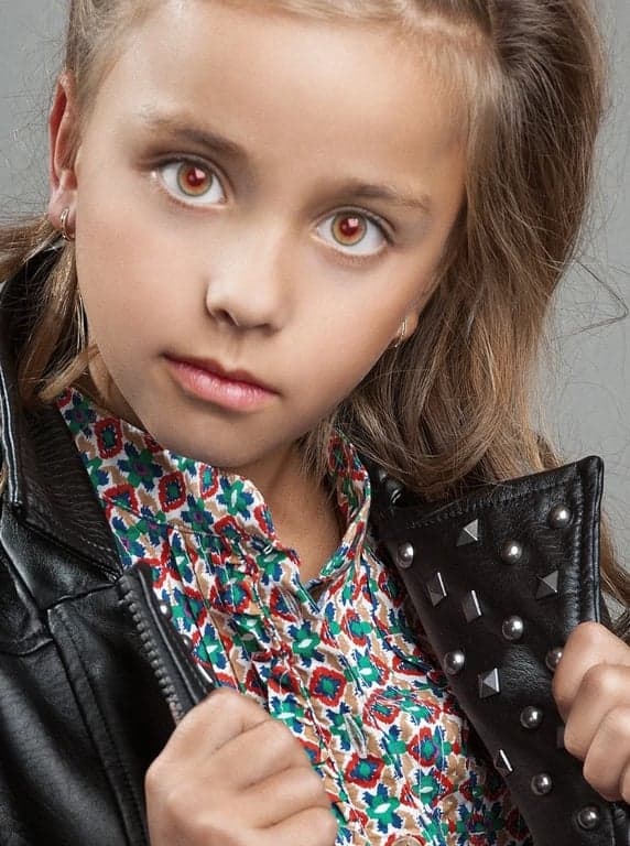 AI red eye remover before photo - portrait with visible red eyes from flash