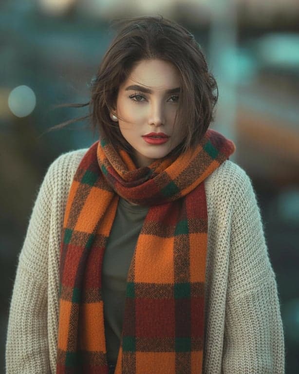 outfit generator ai after photo - woman wearing scarf and sweater