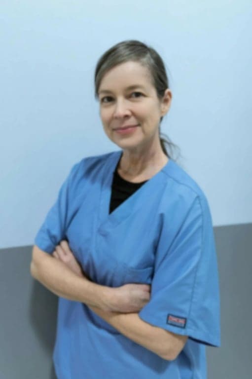 a portrait of a woman transformed with a soft-focus effect, gently blurring under-eye bags and creating a smoother, airbrushed finish