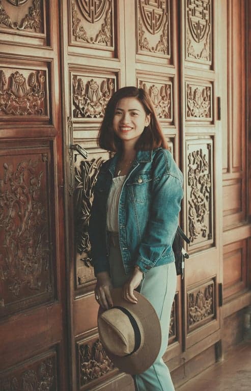 AI big eyes filter before photo - woman wearing blue jacket