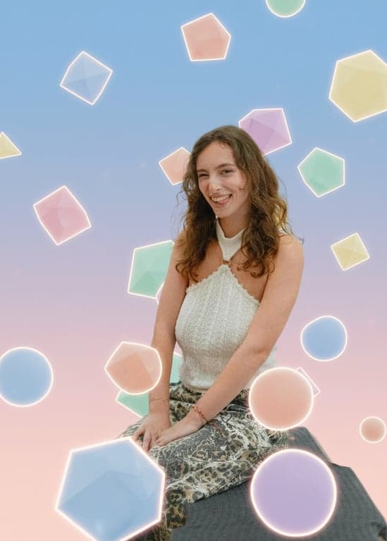 a portrait of a person surrounded by floating 3D geometric shapes (cubes, pyramids) in pastel colors against a gradient background