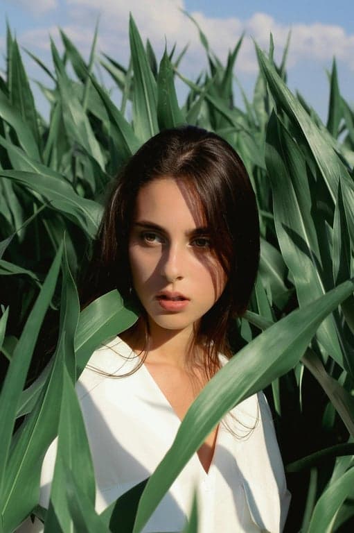 AI tan skin filter after transformation - outdoor photo with radiant tanned look