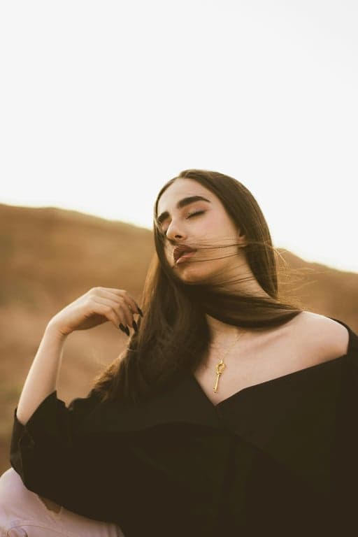 generate a braided hairstyle that incorporates volume, smooth textures, and a natural finish, blending seamlessly with the subject’s overall hairstyle and face shape