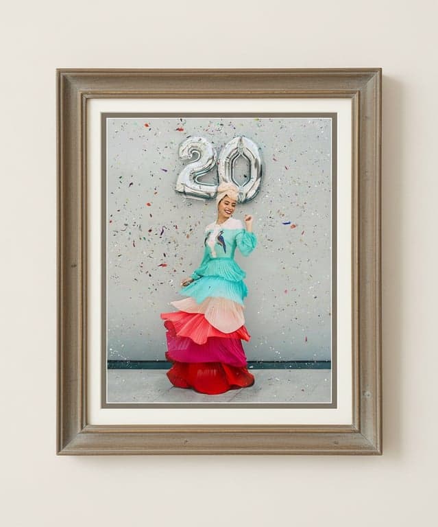 an image enhanced with a minimal antique frame, using simple molding, muted aged tones, clean inner border, accurate scaling to the artwork, preserved image detail, and soft lighting for understated elegance