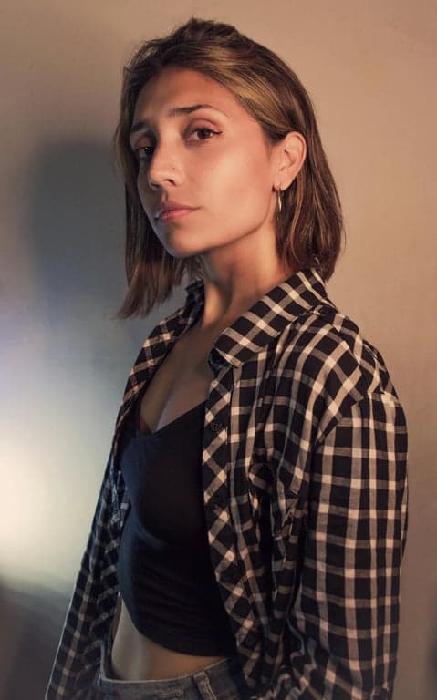 reinterpret the character as a pixel art game sprite. use a strict pixel grid, low resolution pixel style, clear 1-pixel outlines, flat colors, limited color palette, no gradients, no anti-aliasing, front-facing neutral standing pose, clearly separated head, torso, arms, and legs, readable silhouette at 32x32 and 64x64, designed for sprite sheet animation