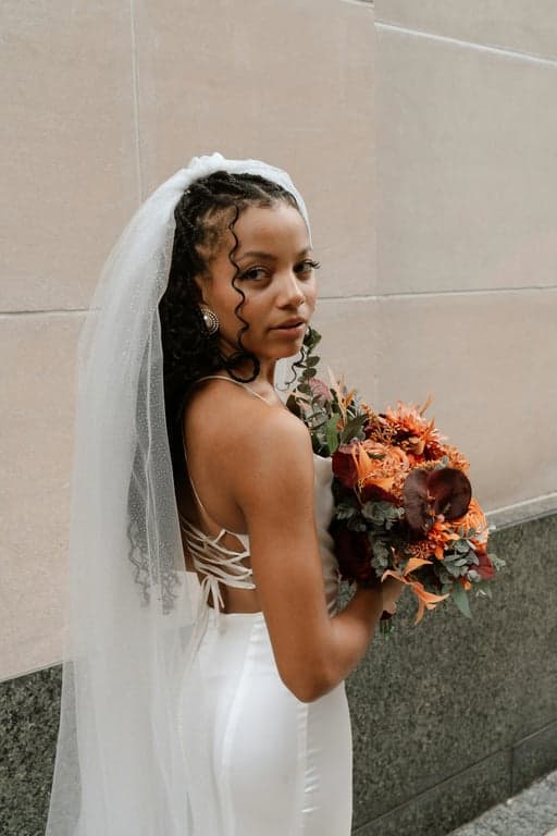 ai action figure generator before – a woman holding folowers