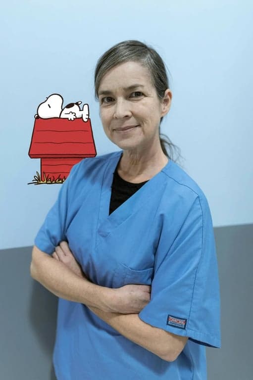 a portrait of a woman, cartoon snoopy overlay, snoopy sleeping on doghouse, whimsical placement, cartoon and photo blend.