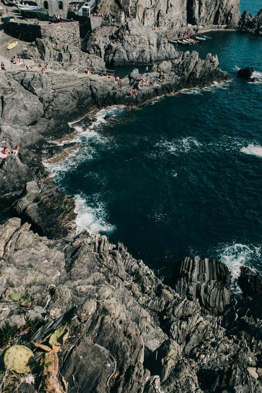 a landscape, classic stretched canvas look, fine linen texture across the entire image, subtle craquelure (fine cracking) effect in darker areas, warm aged varnish tone.