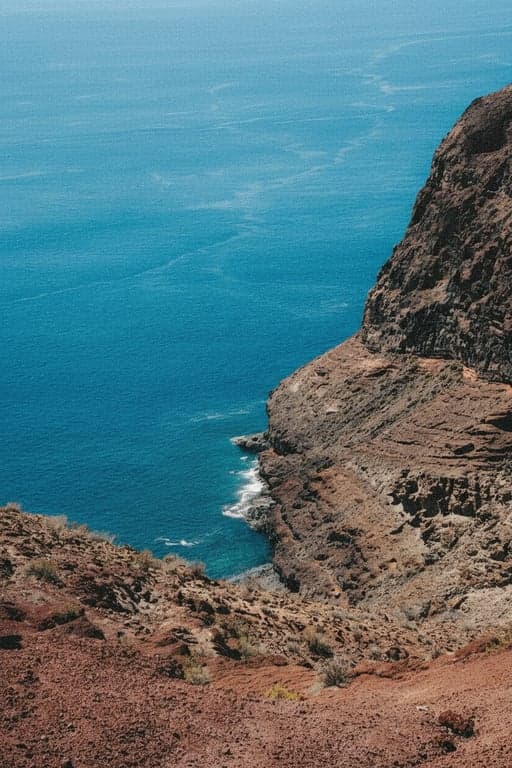 add noise to image after - the same coastal image with heavy coarse noise