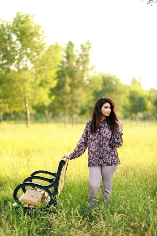 a portrait of a person illustrated as a Scooby-Doo–style Hanna-Barbera character with oversized head, simplified body, wide-set eyes, rounded nose, flat color blocks, and no modern illustration techniques