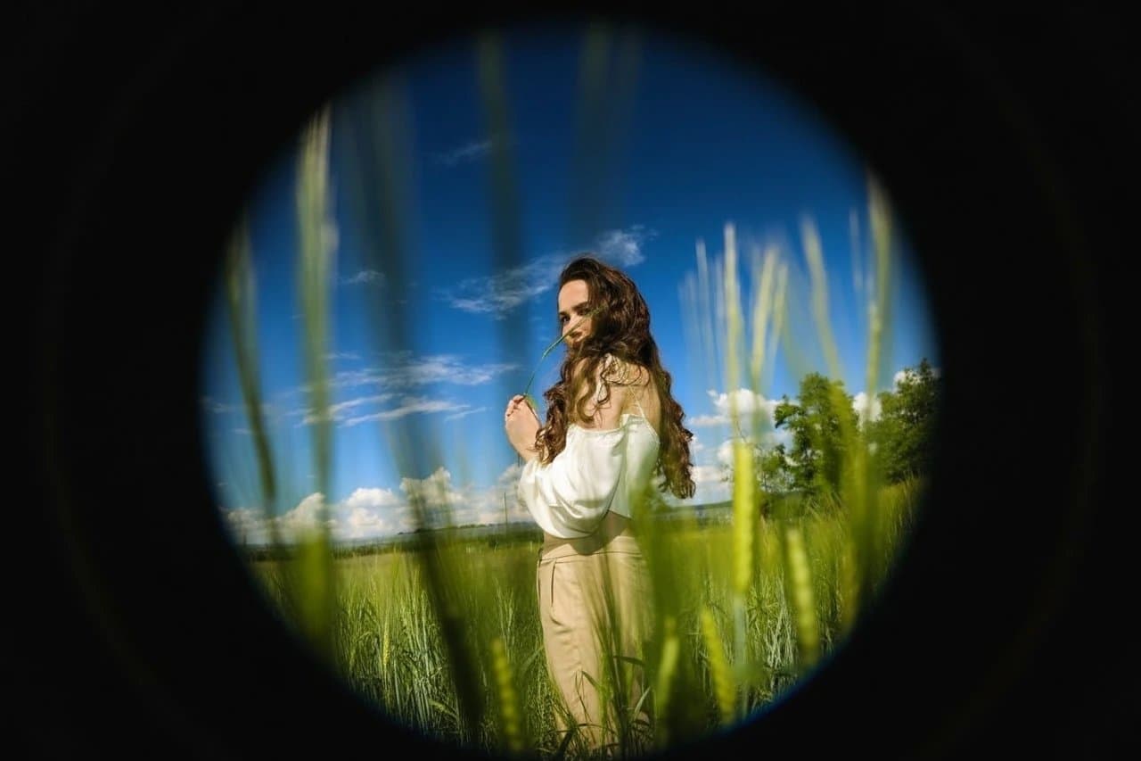 AI fisheye lens filter after transformation - influencer photo with dramatic fisheye warp