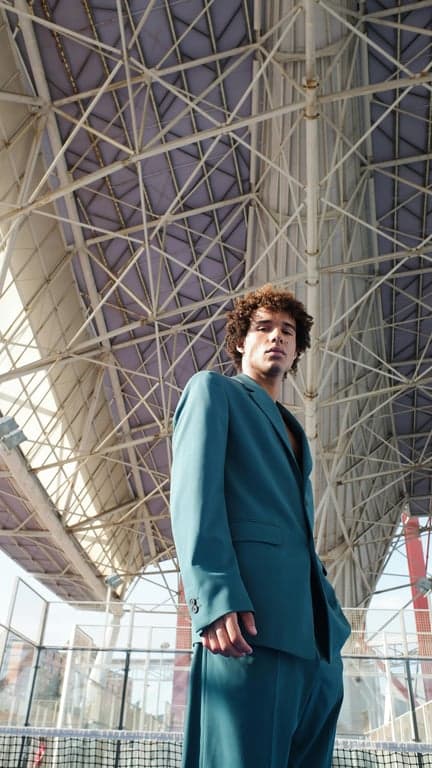 A man from a specific historical era, e.g., a Renaissance nobleman with period clothing and hairstyle, painted in the style of a classic oil portrait.